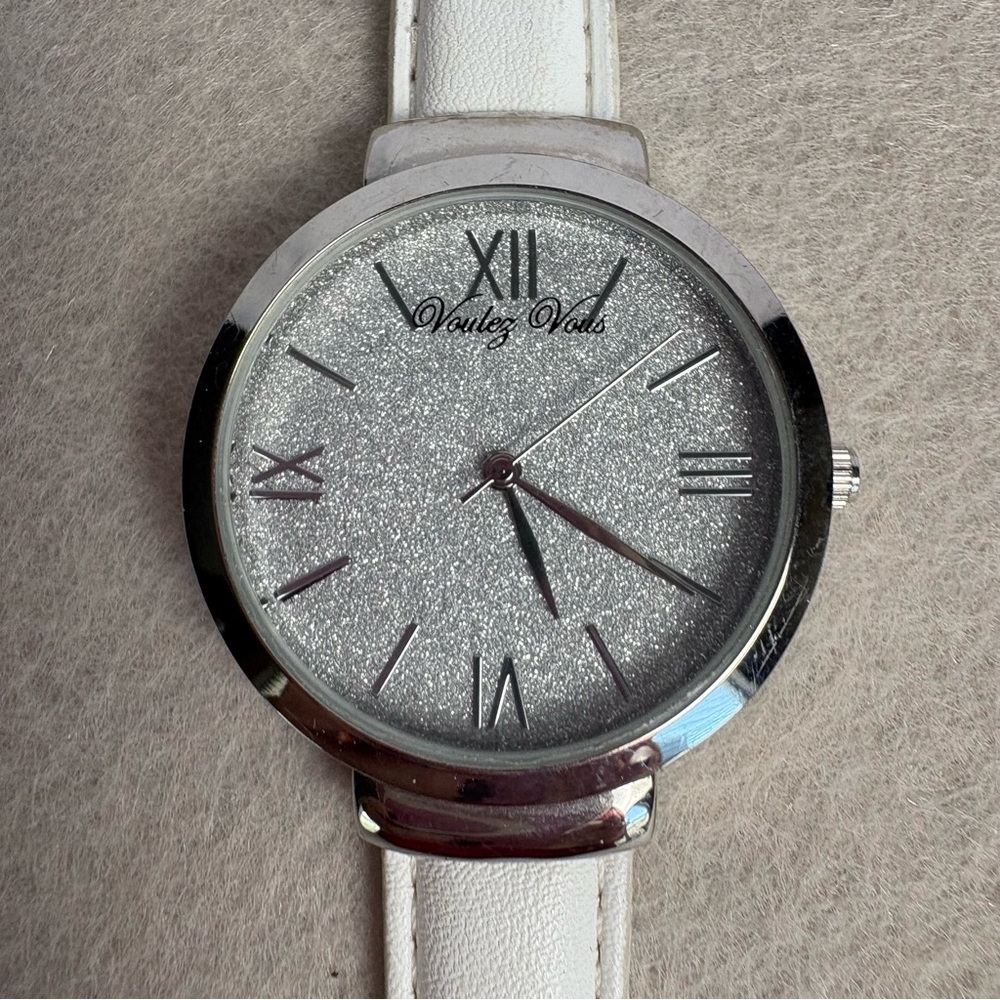 Voulez Vous Silver and White Glitter Face Women's Watch